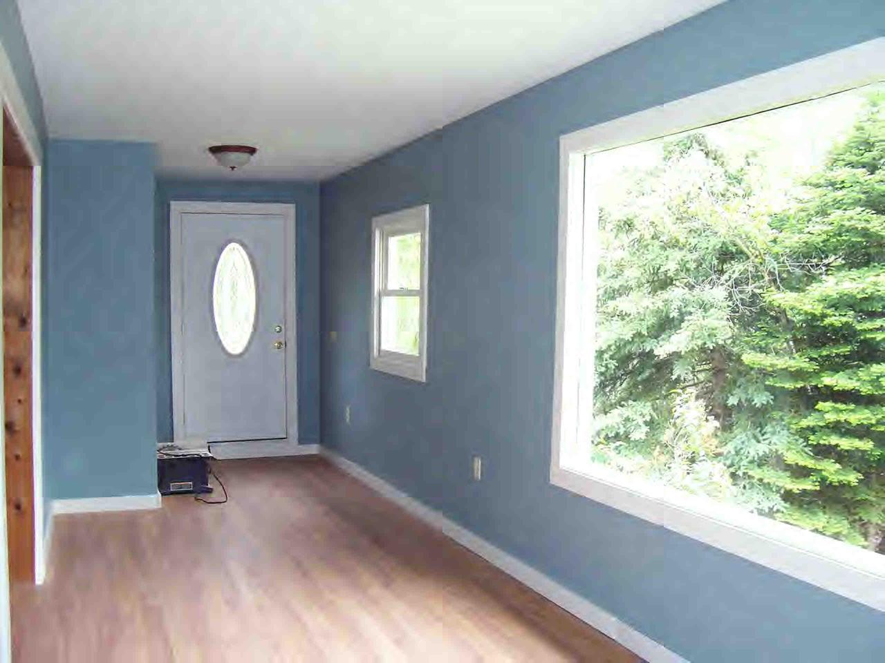 48 Access Road Windsor, MA 01270 - Photo 6 of 8 a view of a room with wooden floor and window