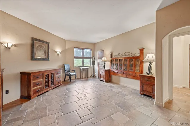 a large living room with a large window