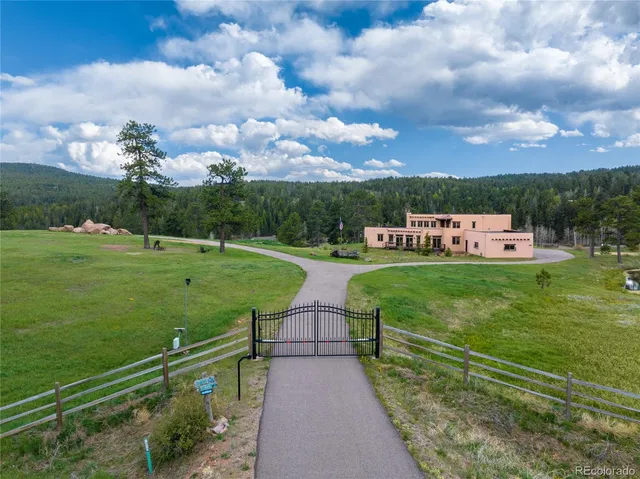 a view of a golf course with a garden