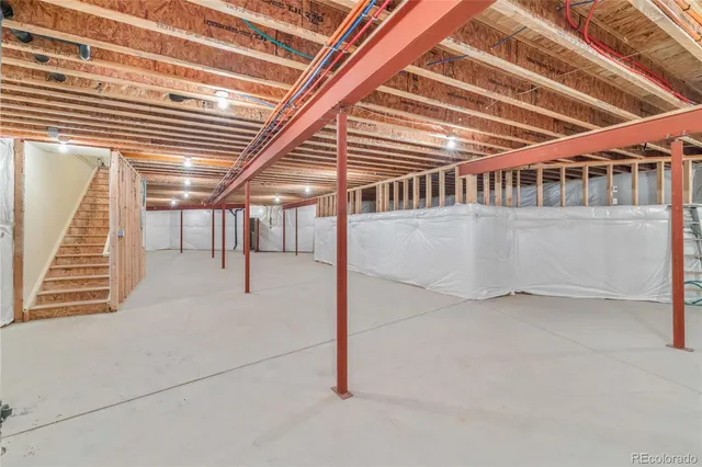 a view of a town with mountains in the background
