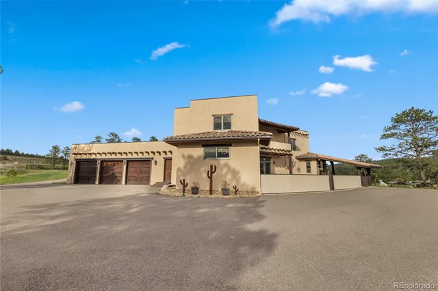a view of a big building with swimming pool