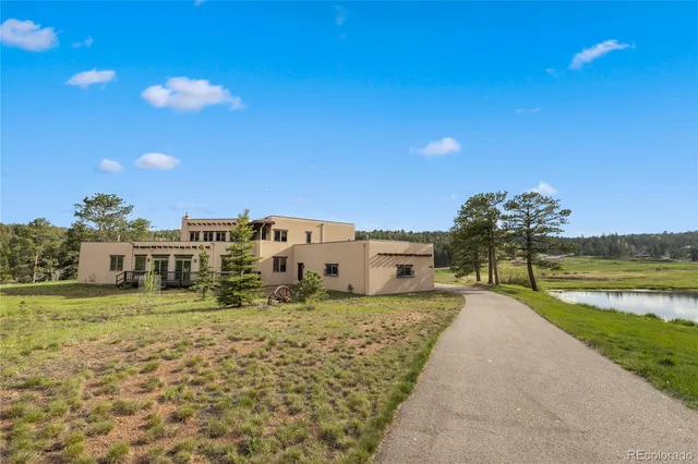 a view of a lake with a building in the background