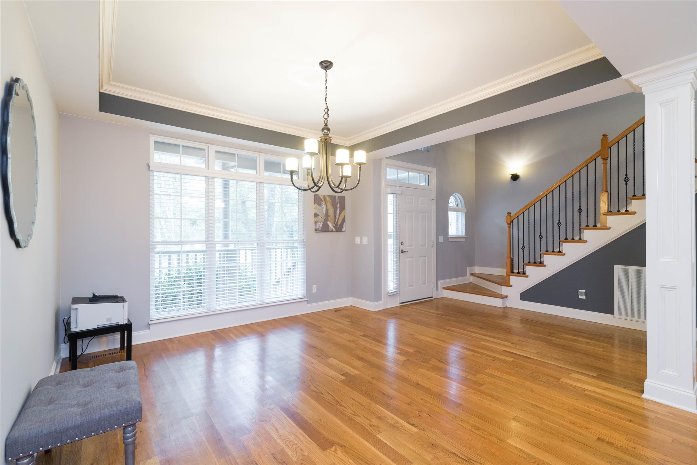 623 Tulip Grove Road Hermitage, TN 37076 - Photo 2 of 30 a view of an empty room with wooden floor and a window