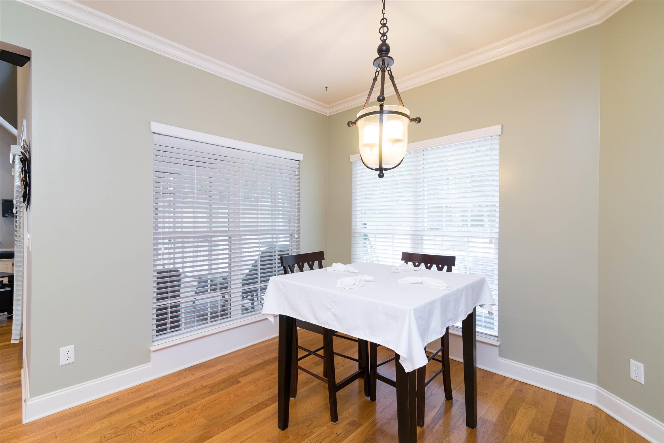 623 Tulip Grove Road Hermitage, TN 37076 - Photo 12 of 30 a view of a dining room with furniture window and wooden floor