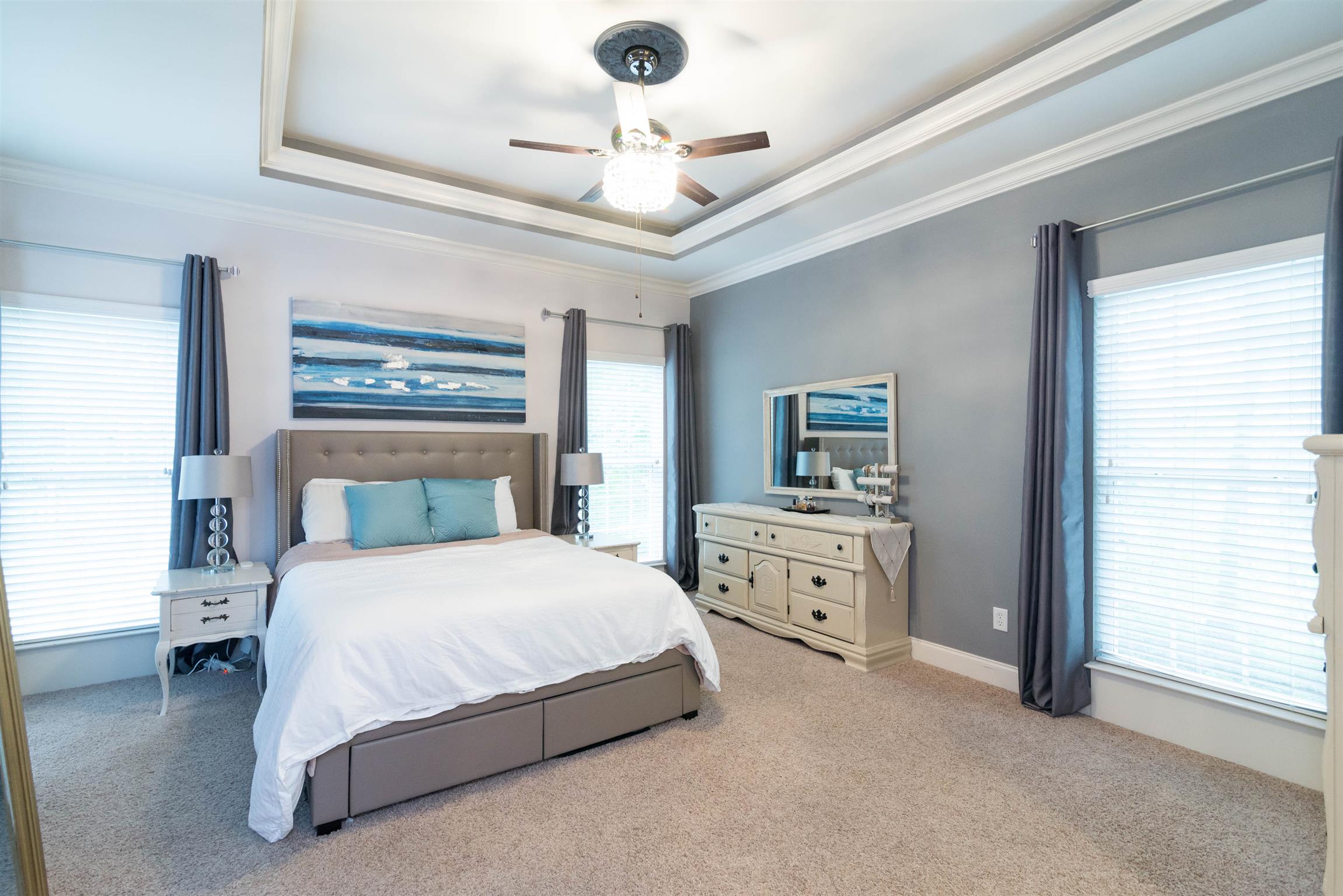 623 Tulip Grove Road Hermitage, TN 37076 - Photo 13 of 30 a bedroom with a large bed and ceiling fan