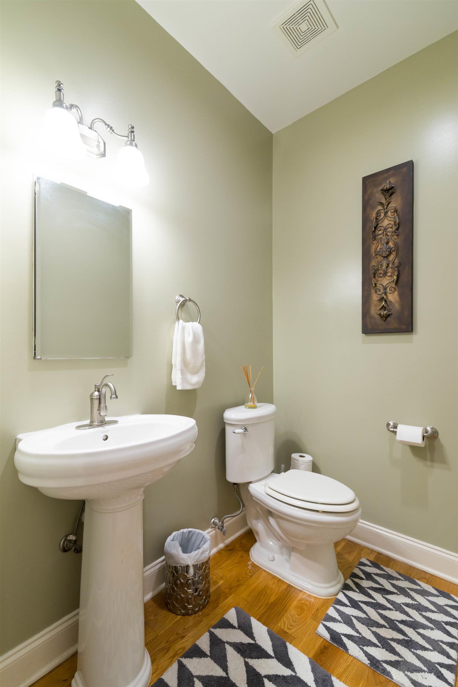 623 Tulip Grove Road Hermitage, TN 37076 - Photo 16 of 30 a bathroom with a sink toilet and a mirror