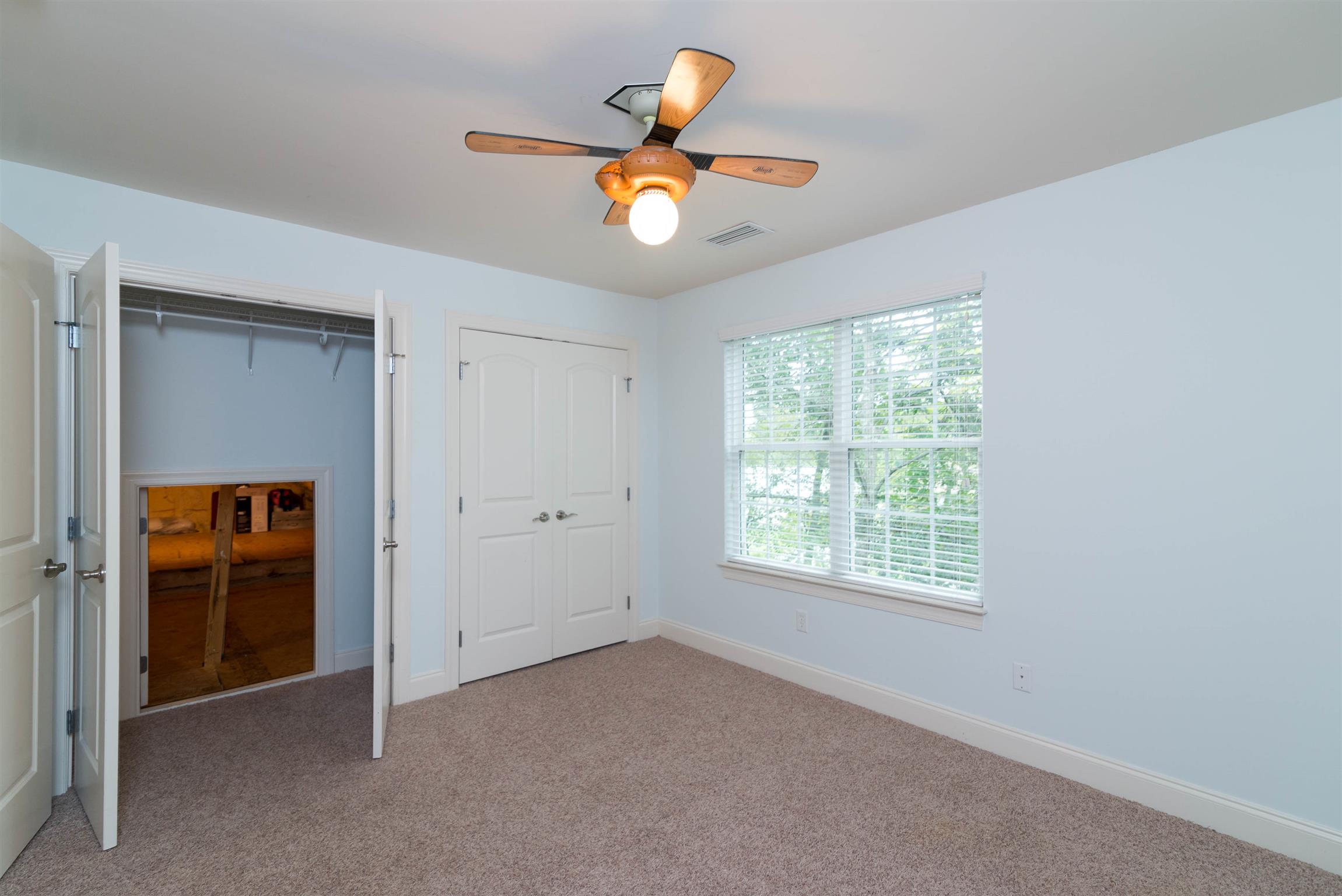 623 Tulip Grove Road Hermitage, TN 37076 - Photo 20 of 30 a view of an empty room with window and cabinet