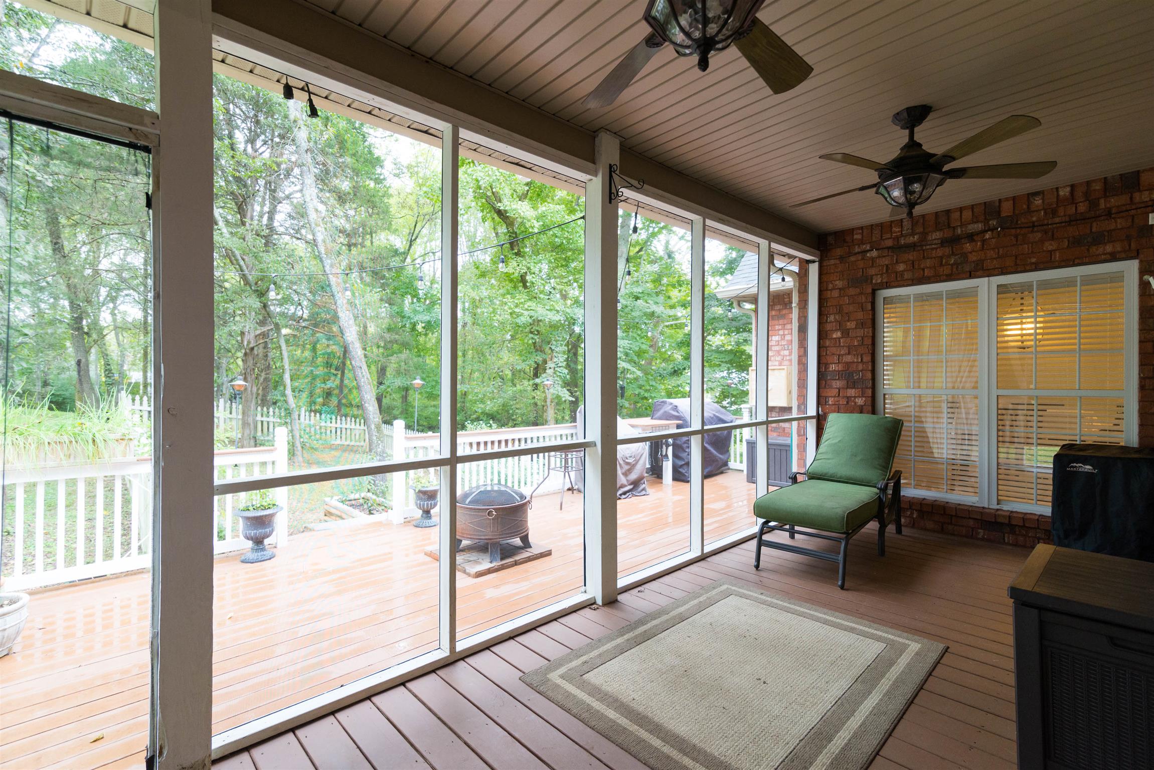623 Tulip Grove Road Hermitage, TN 37076 - Photo 25 of 30 a living room with furniture and a floor to ceiling window