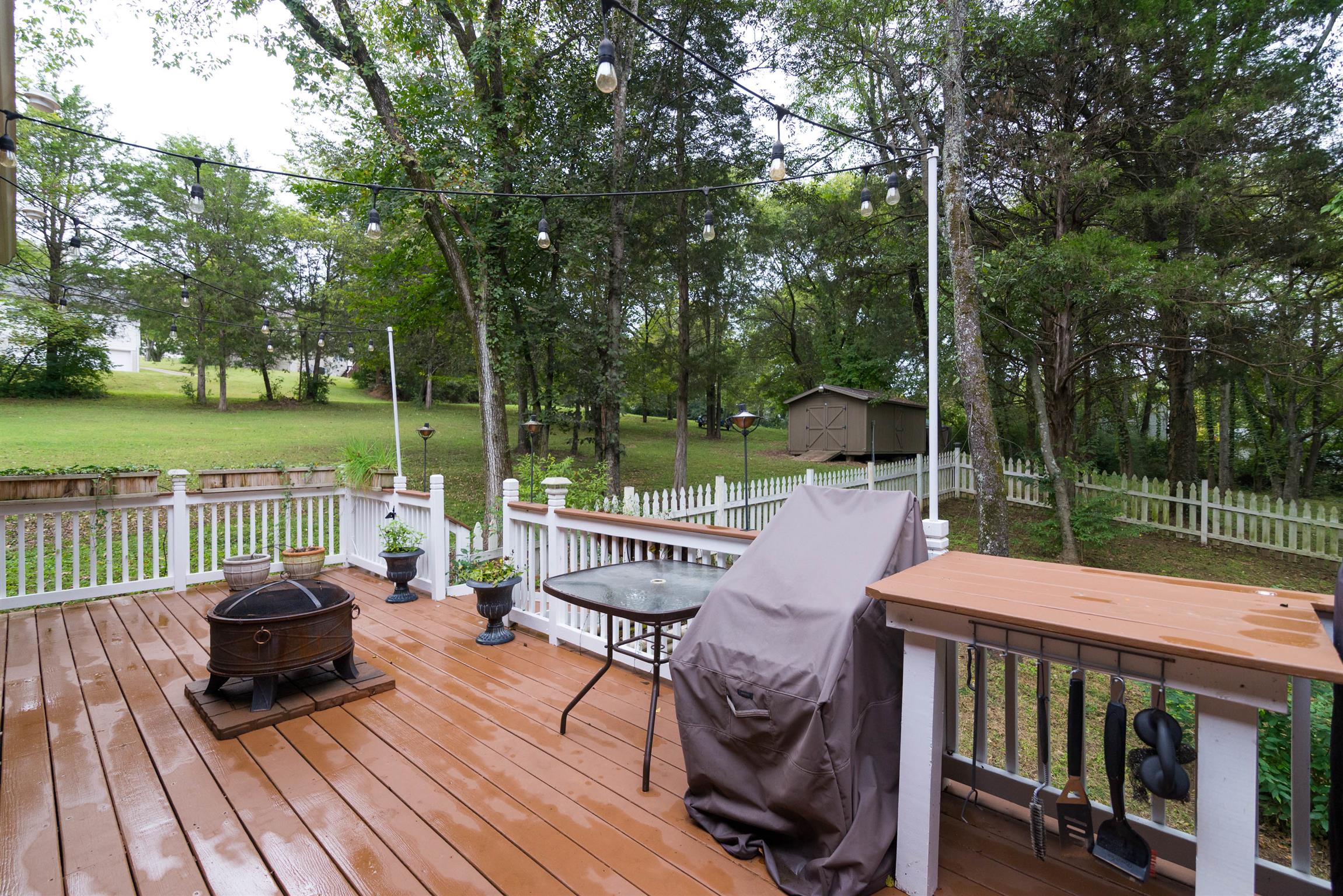623 Tulip Grove Road Hermitage, TN 37076 - Photo 27 of 30 a view of a patio with two chairs and a table