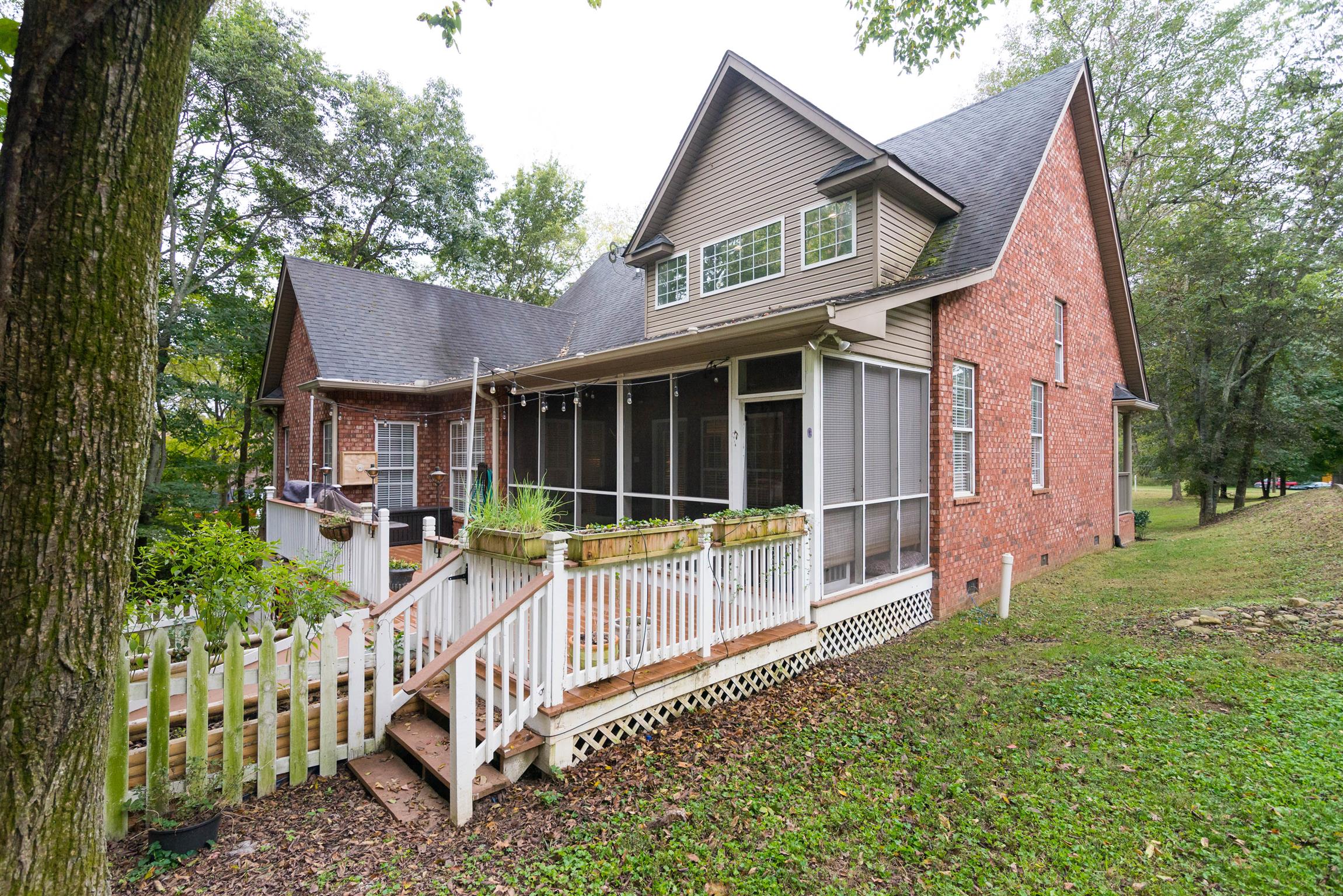 623 Tulip Grove Road Hermitage, TN 37076 - Photo 29 of 30 a view of a house with a yard and sitting area