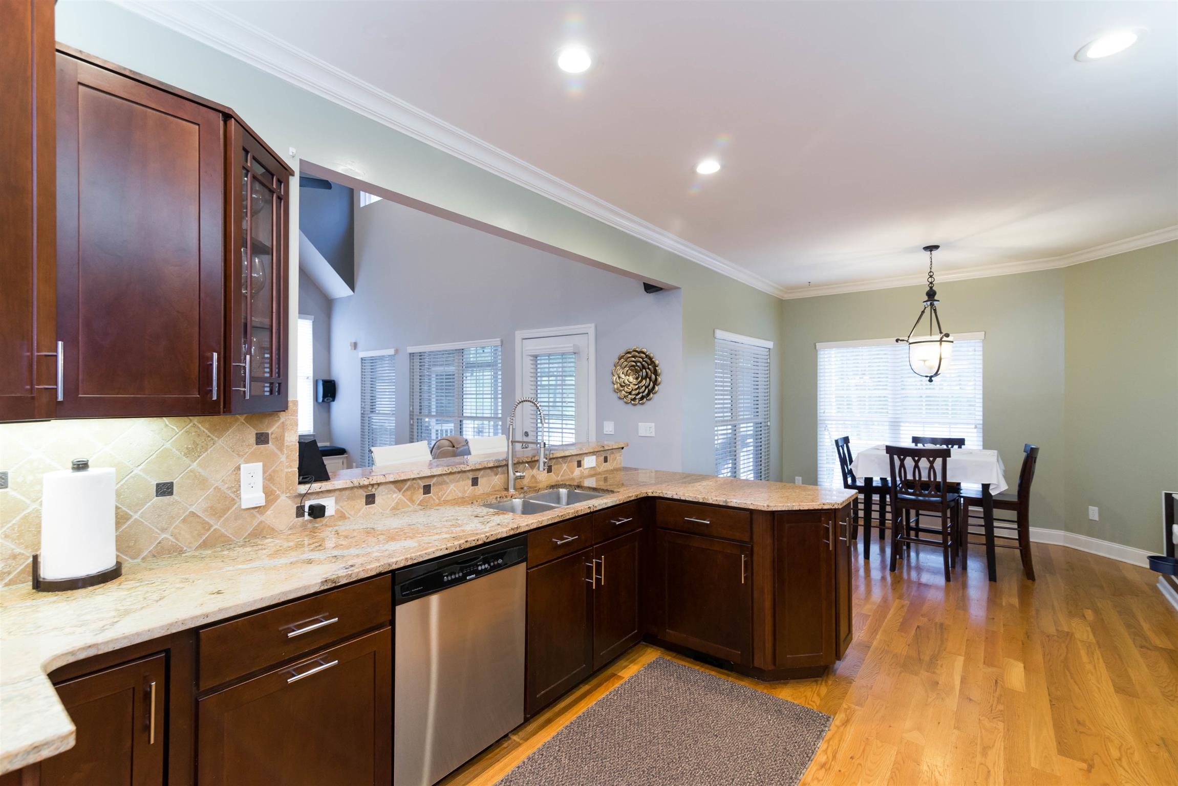 623 Tulip Grove Road Hermitage, TN 37076 - Photo 10 of 30 a kitchen with lots of counter top space and dining table