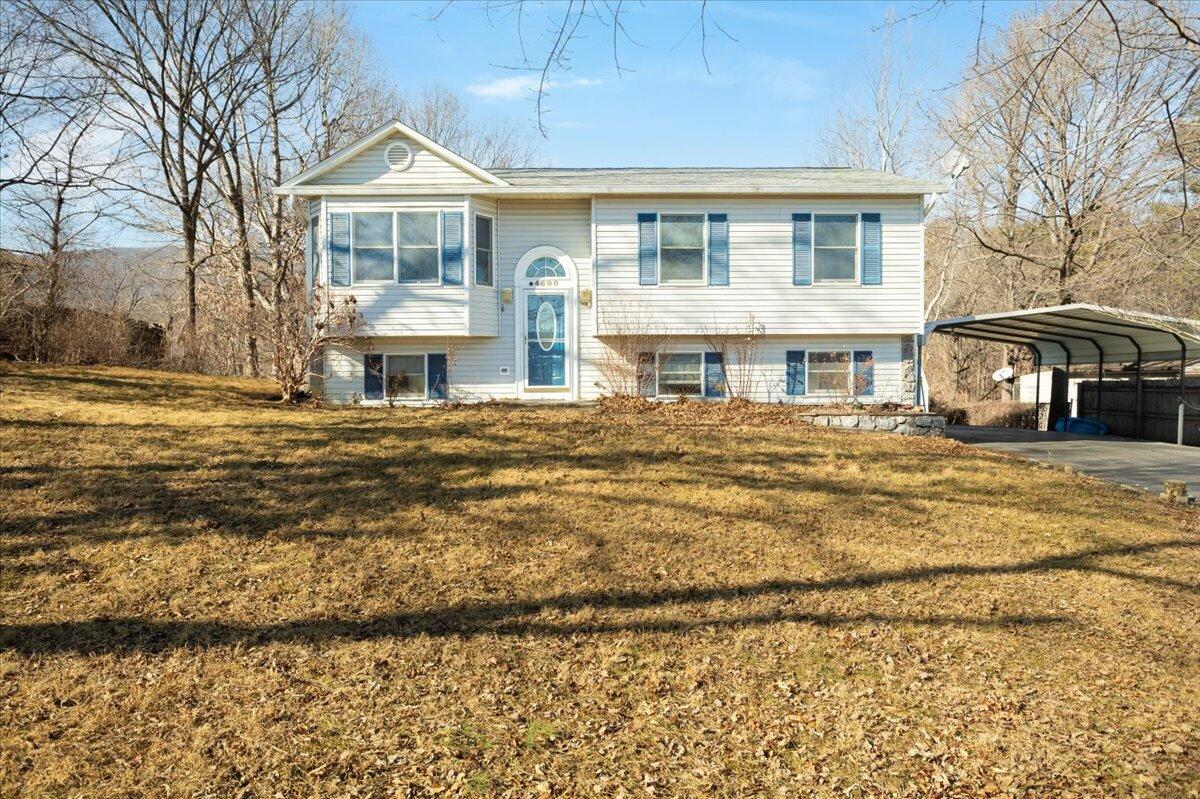a front view of a house with a ocean view