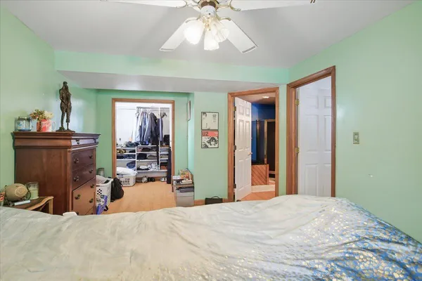 a bed room with a bed and furniture