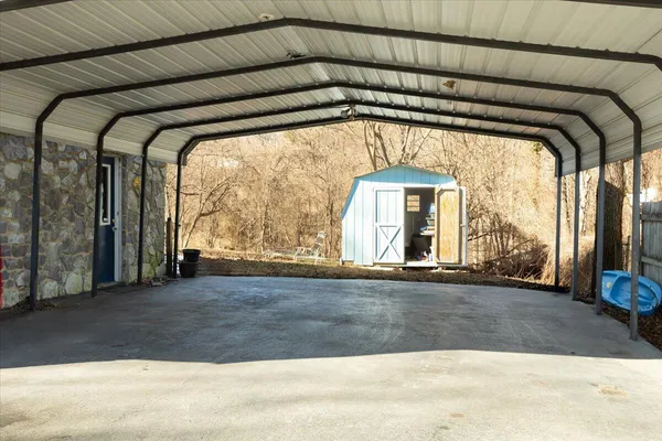 a view of house with yard