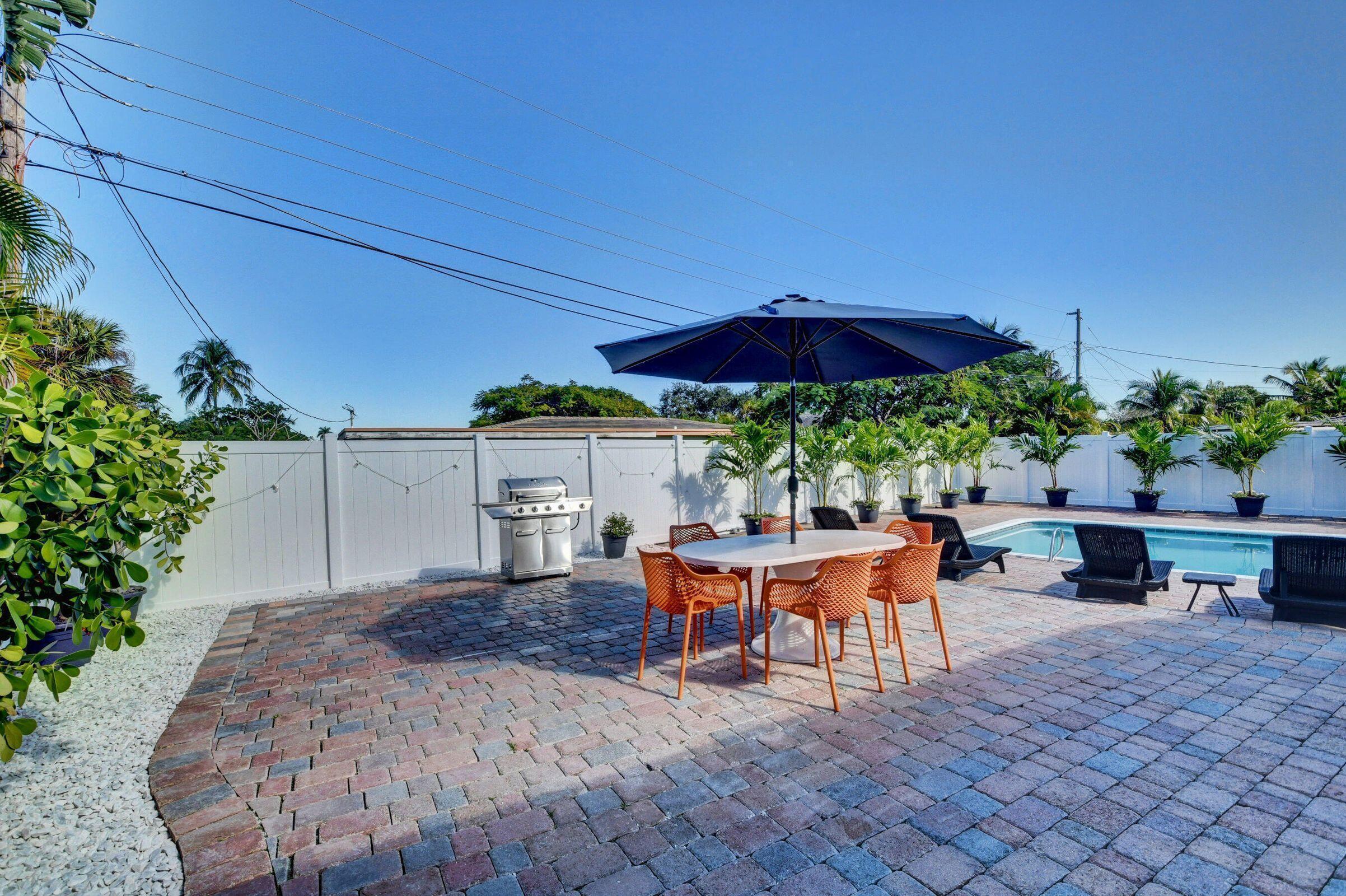 251 Northeast 2nd Circle Boca Raton, FL 33431 - Photo 12 of 16 Pool area with Barbeque