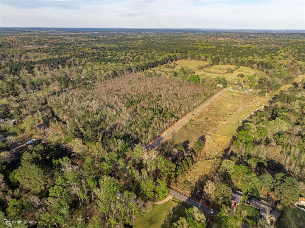 Overview of rural landscape with a heavily wooded area