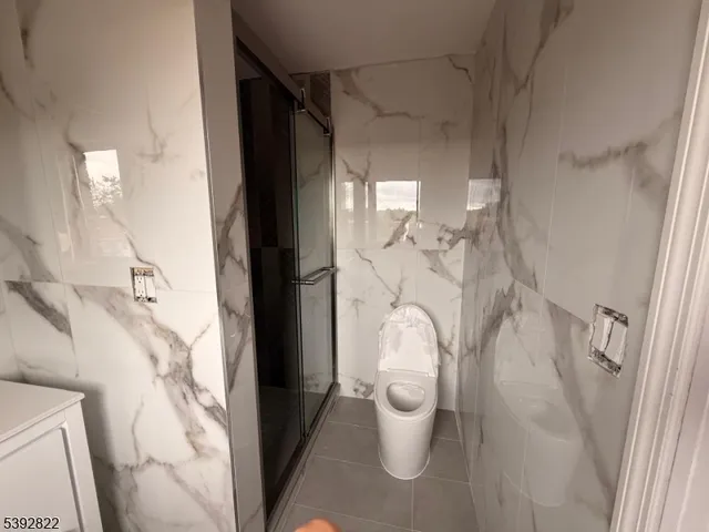 a picture of a bathroom with a sink and a mirror
