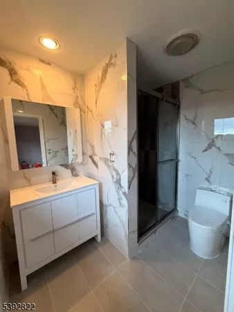 a bathroom with a bathtub and a sink