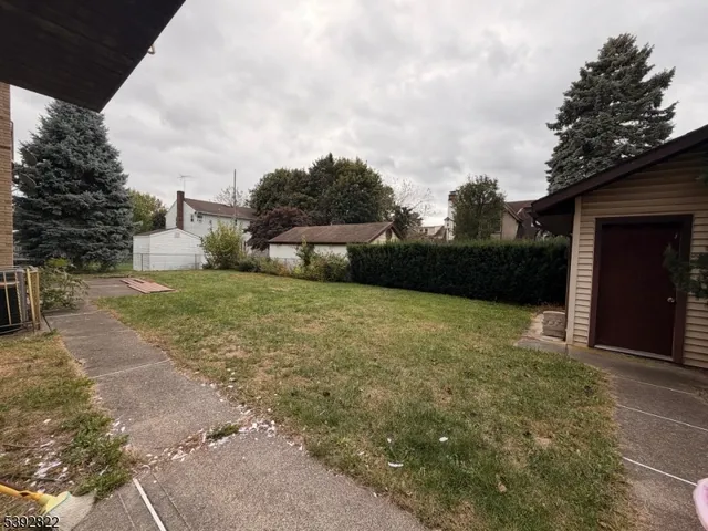 a view of a garden with an outdoor space