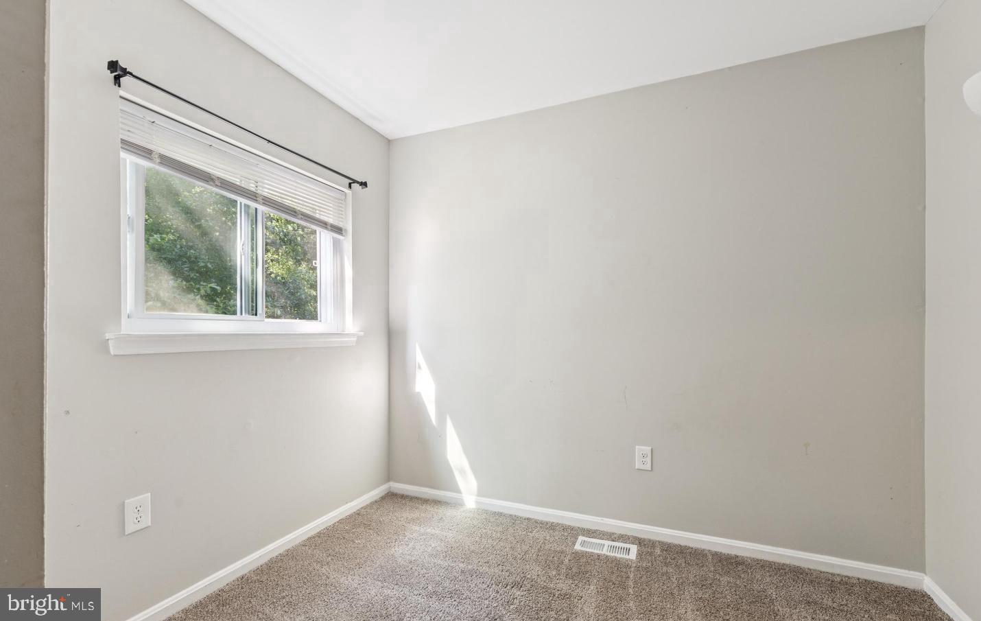 3059 Heath Cote Road Waldorf, MD 20602 - Photo 11 of 15 an empty room with a window