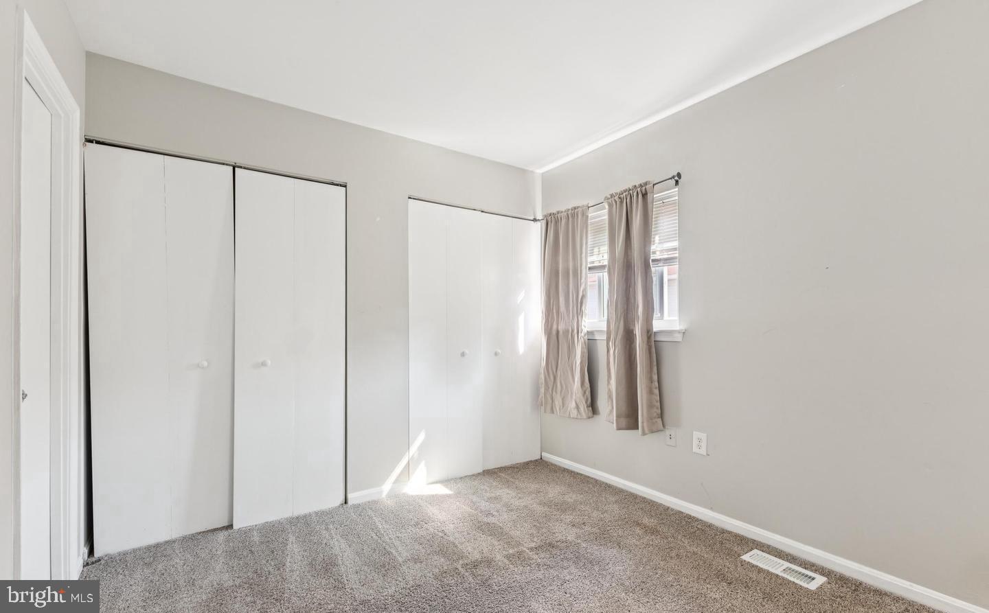 3059 Heath Cote Road Waldorf, MD 20602 - Photo 9 of 15 an empty room with windows