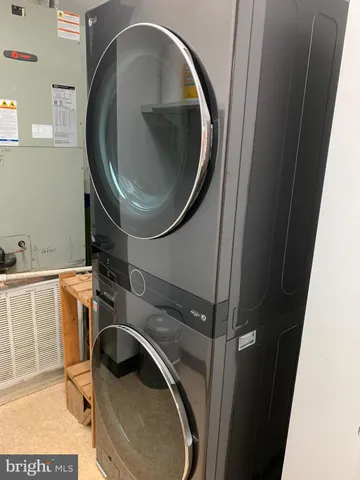 a room with gym equipment and a large window