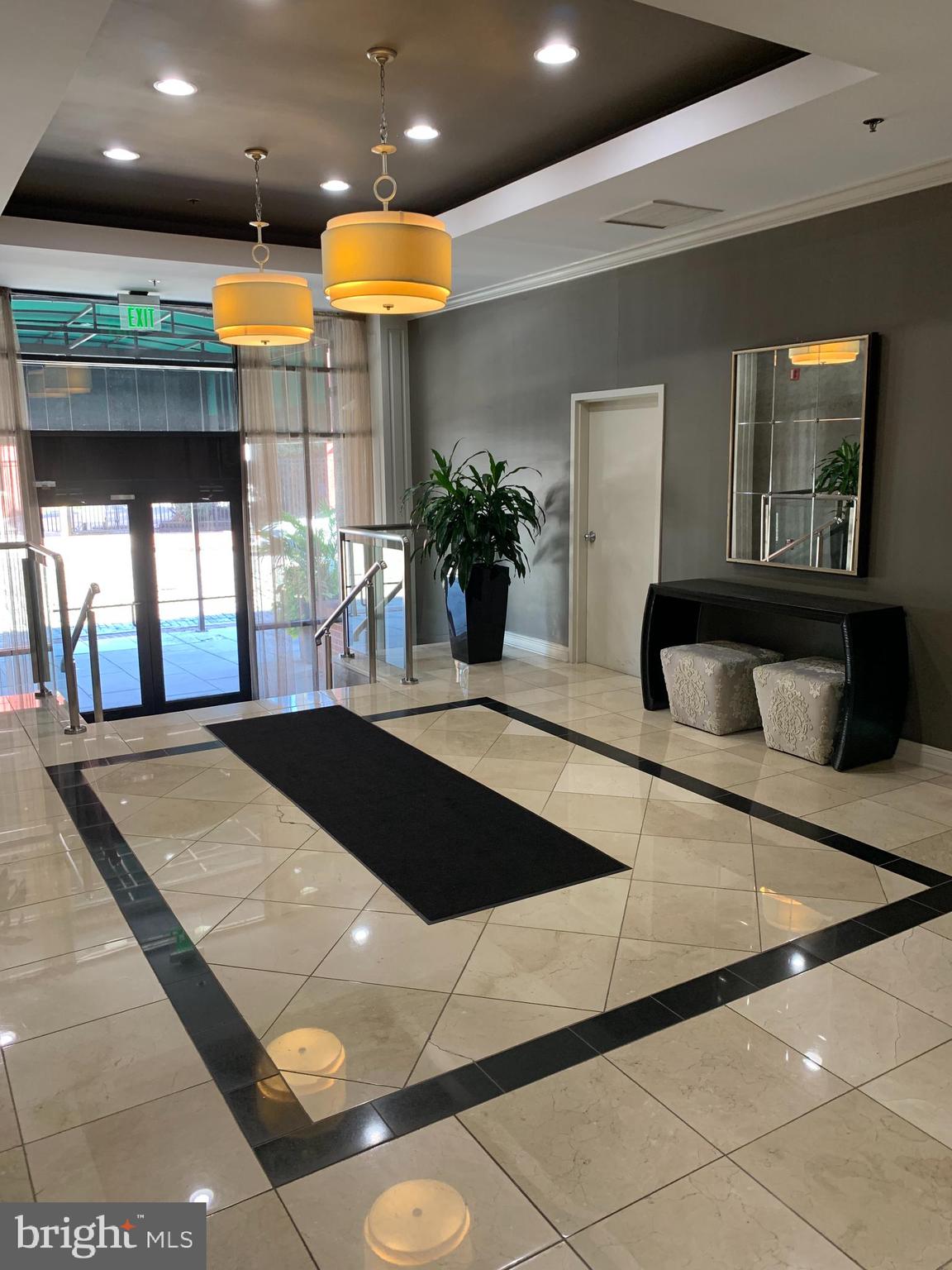 960 Fell Street, Unit 504 Baltimore, MD 21231 - Photo 3 of 32 a view of a living room and entryway