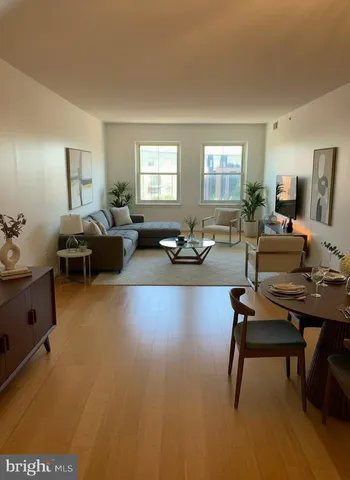 a living room with furniture and a window