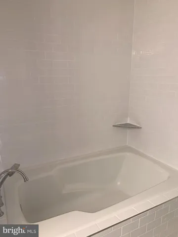 a close up of a bathtub