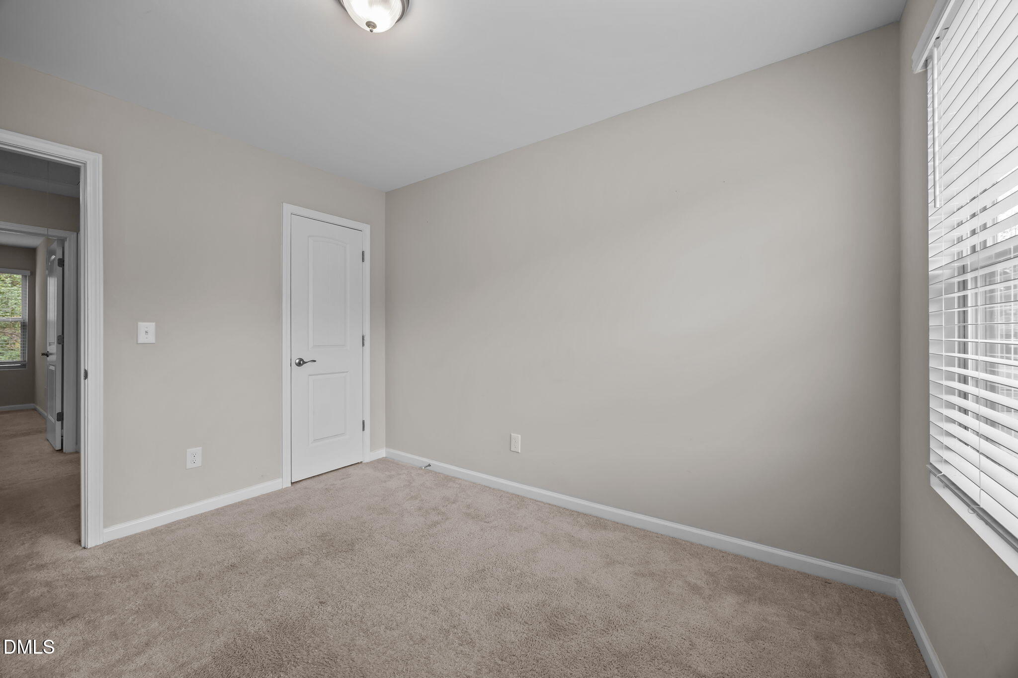 221 Socket Street Raleigh, NC 27606 - Photo 18 of 28 an empty room with windows