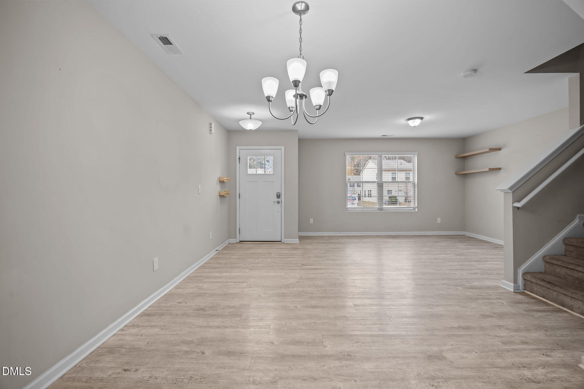 221 Socket Street Raleigh, NC 27606 - Photo 8 of 28 a view of an empty room with a window