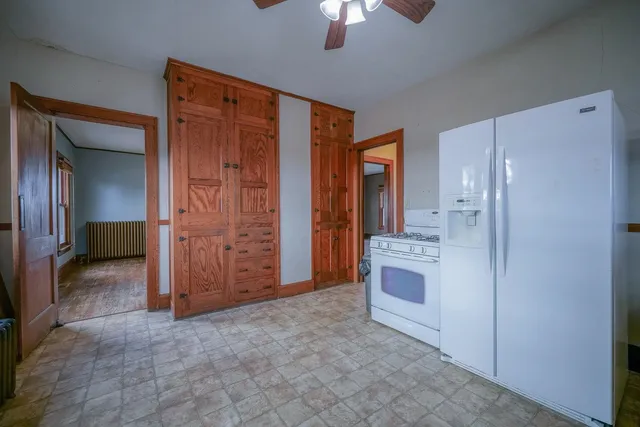 a view of a hallway with closet and entryway