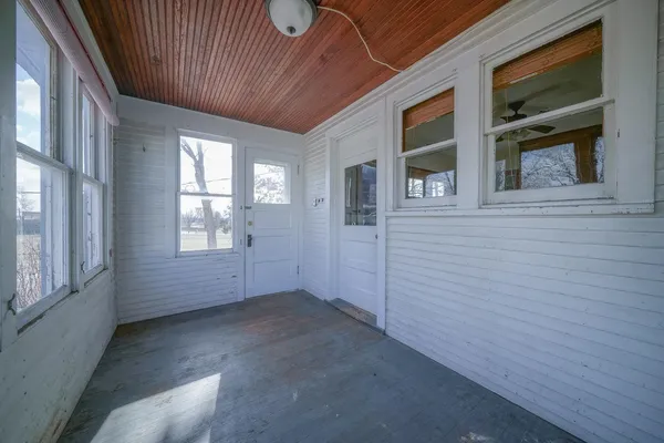 a view of room with refrigerator