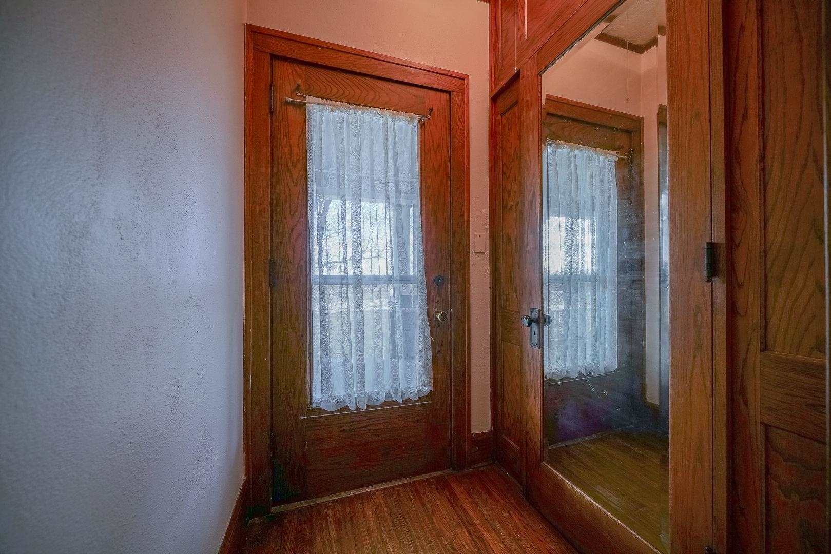 6259 North Pecatonica Road Pecatonica, IL 61063 - Photo 44 of 48 a view of front door with wooden floor