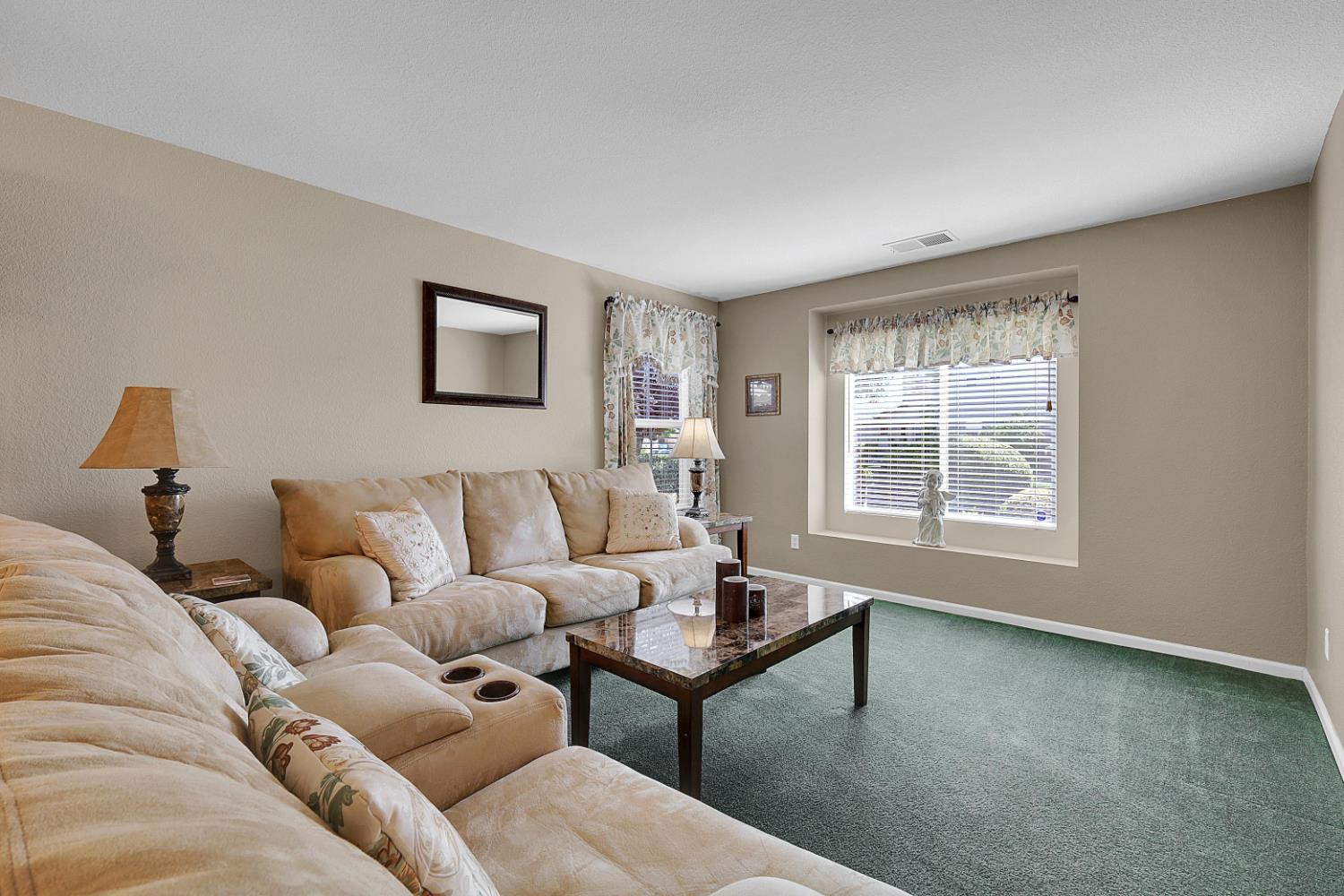9840 Ellis Way Live Oak, CA 95953 - Photo 5 of 44 a living room with furniture and a window