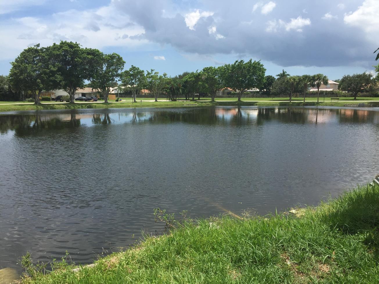 9276 Saddlebrook Drive Boca Raton, FL 33496 - Photo 10 of 10 a view of lake