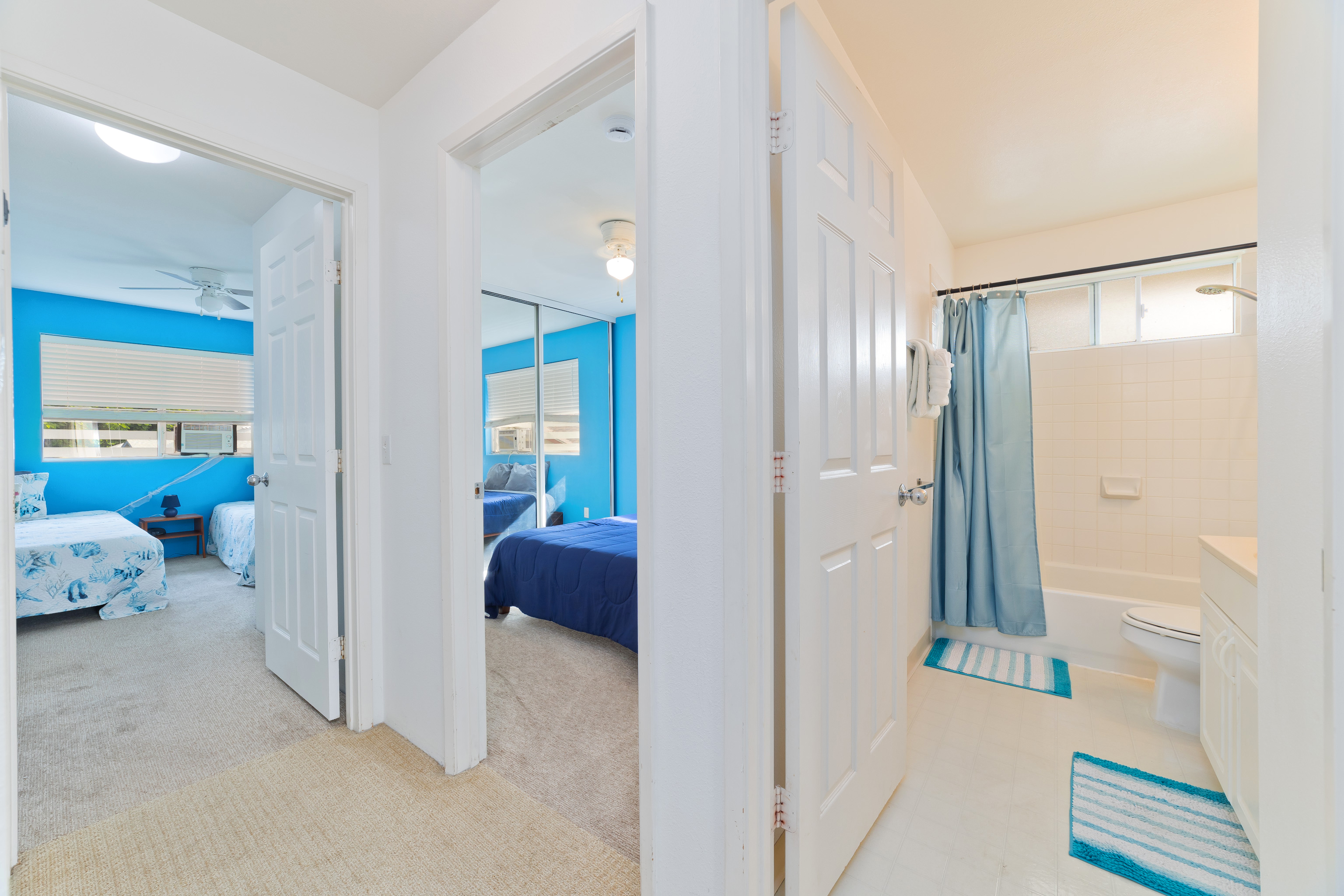 75-6081 Alii Drive, Unit O201 Kailua-Kona, HI 96740 - Photo 21 of 28 a view of hallway with livingroom and furniture