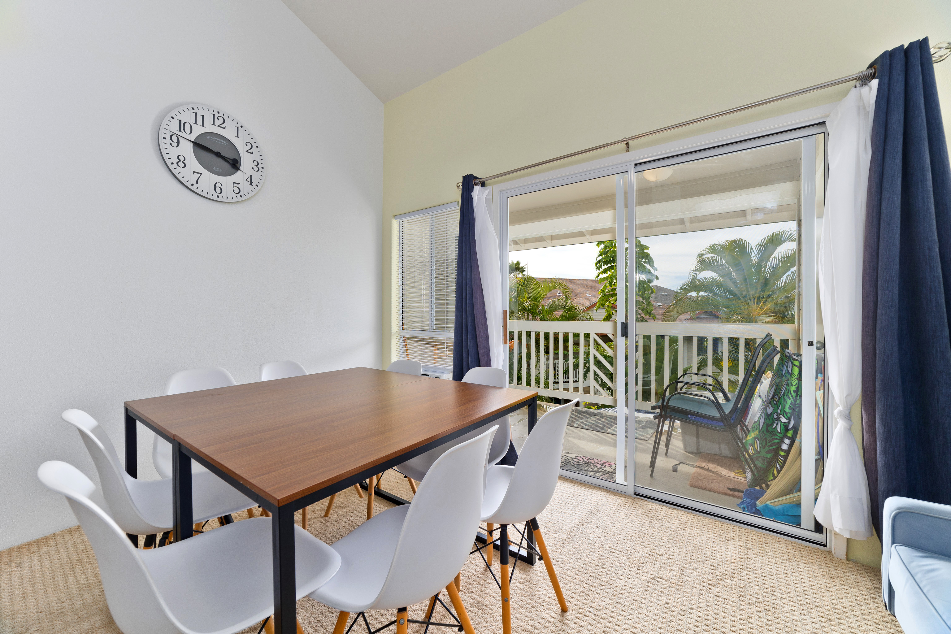 75-6081 Alii Drive, Unit O201 Kailua-Kona, HI 96740 - Photo 7 of 28 a view of a room with a table and chairs
