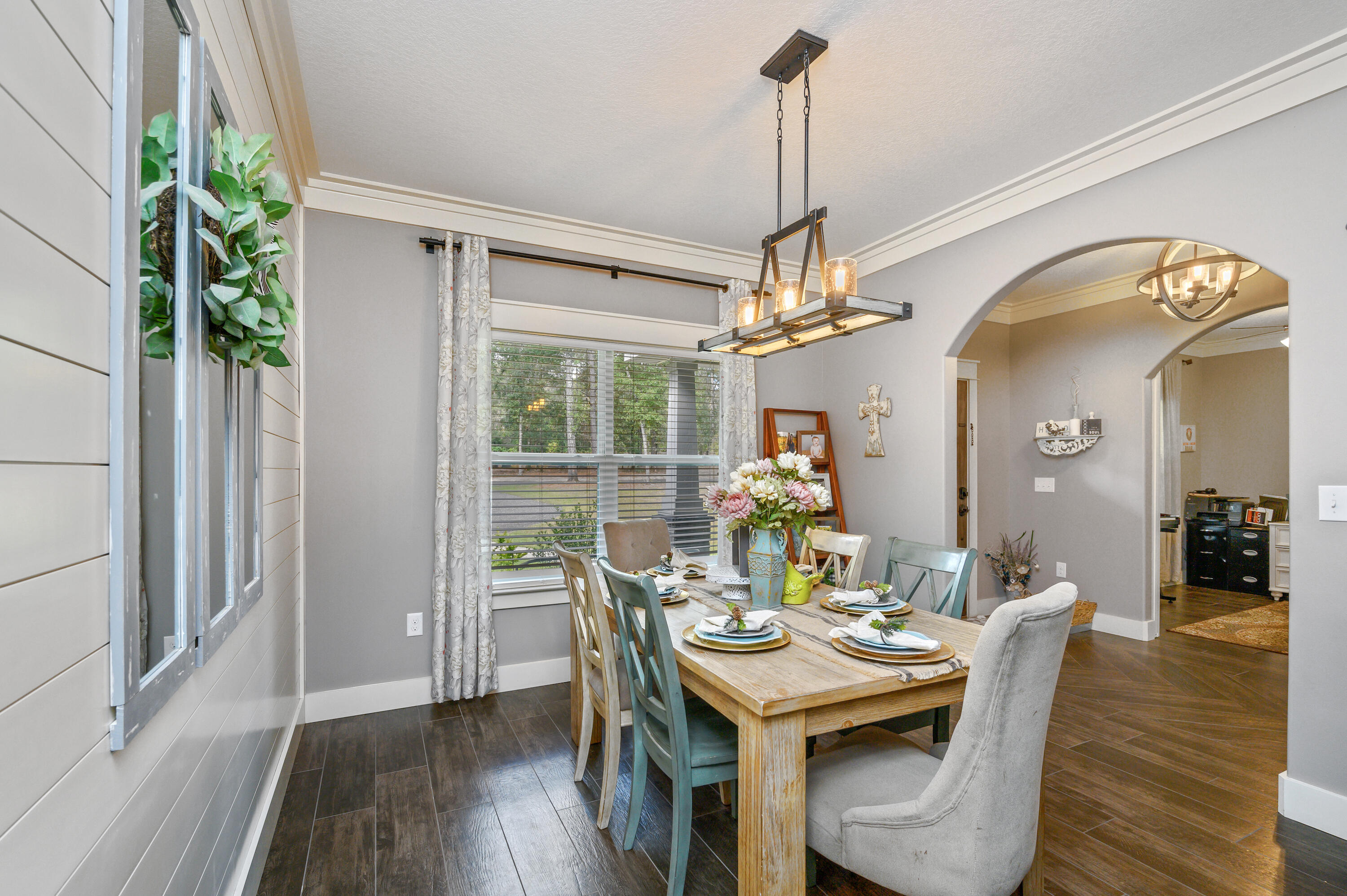 6053 Dairy Road Baker, FL 32531 - Photo 15 of 55 a view of a dining room with furniture window and wooden floor