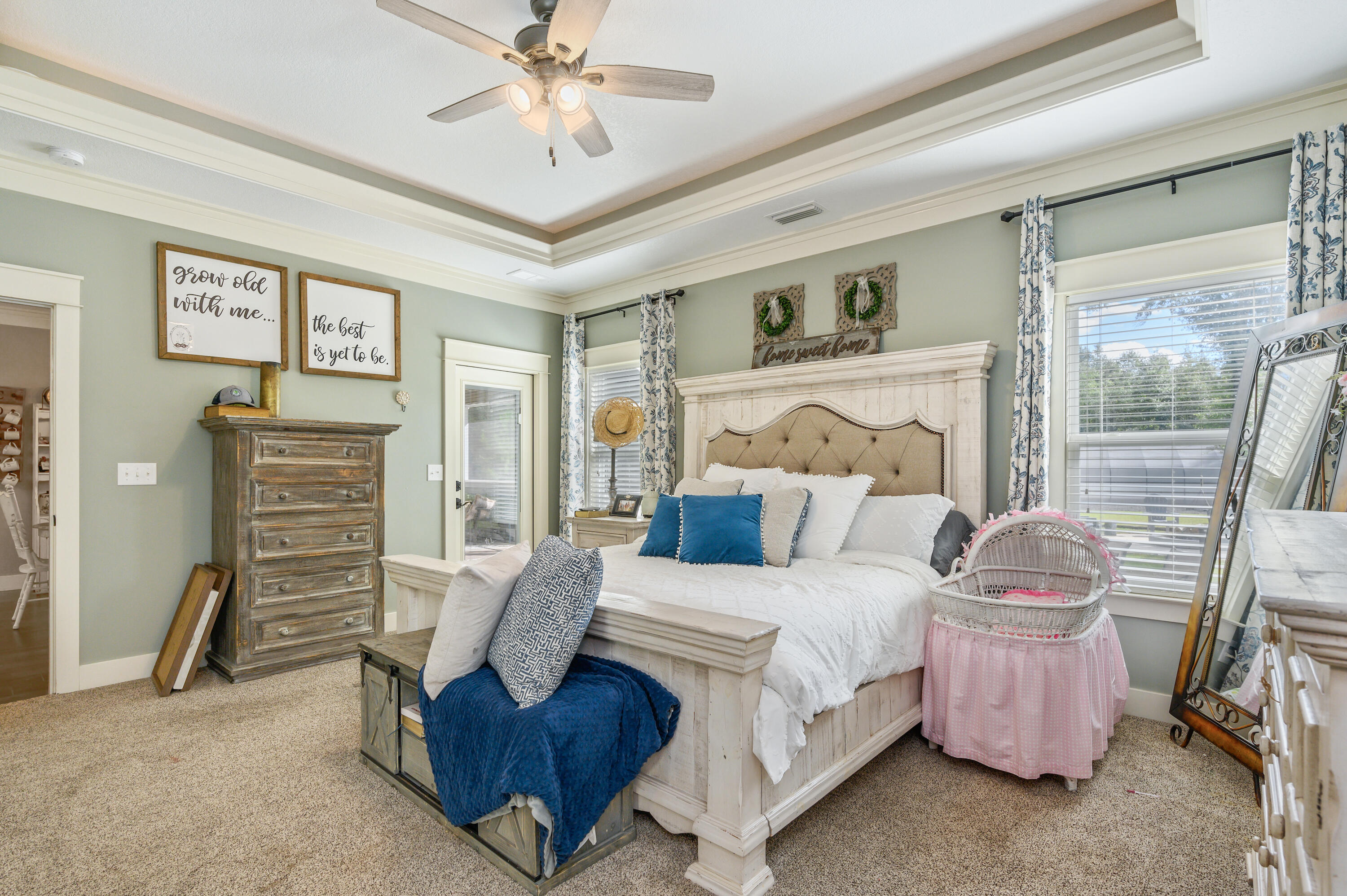 6053 Dairy Road Baker, FL 32531 - Photo 23 of 55 a bedroom with a bed and ceiling fan