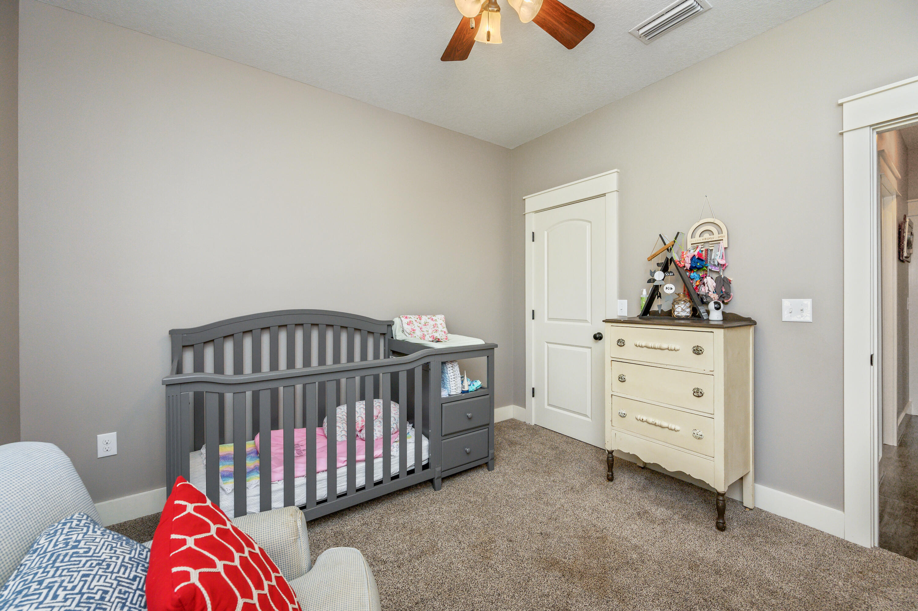 6053 Dairy Road Baker, FL 32531 - Photo 31 of 55 a bedroom with furniture and a window