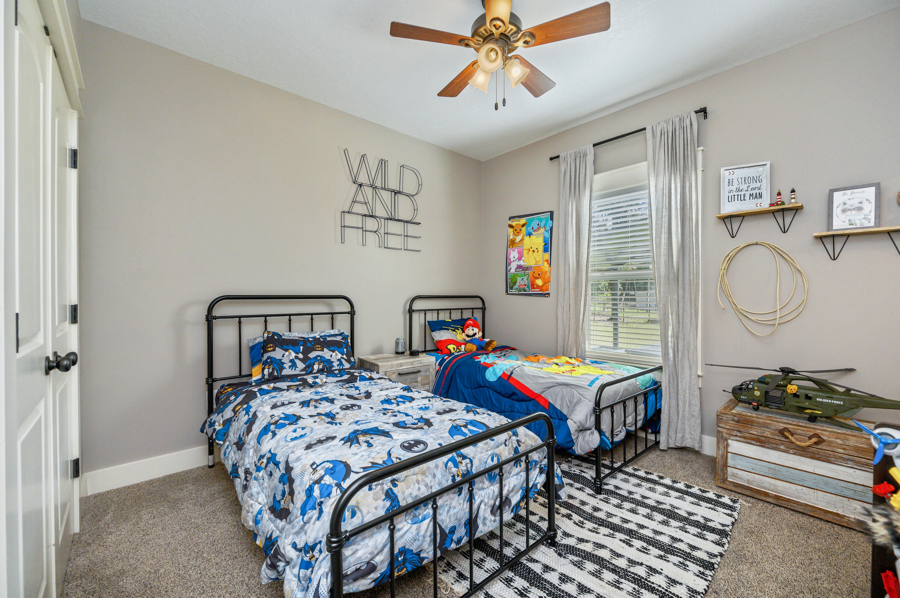 6053 Dairy Road Baker, FL 32531 - Photo 34 of 55 a bedroom with bed and wooden floor