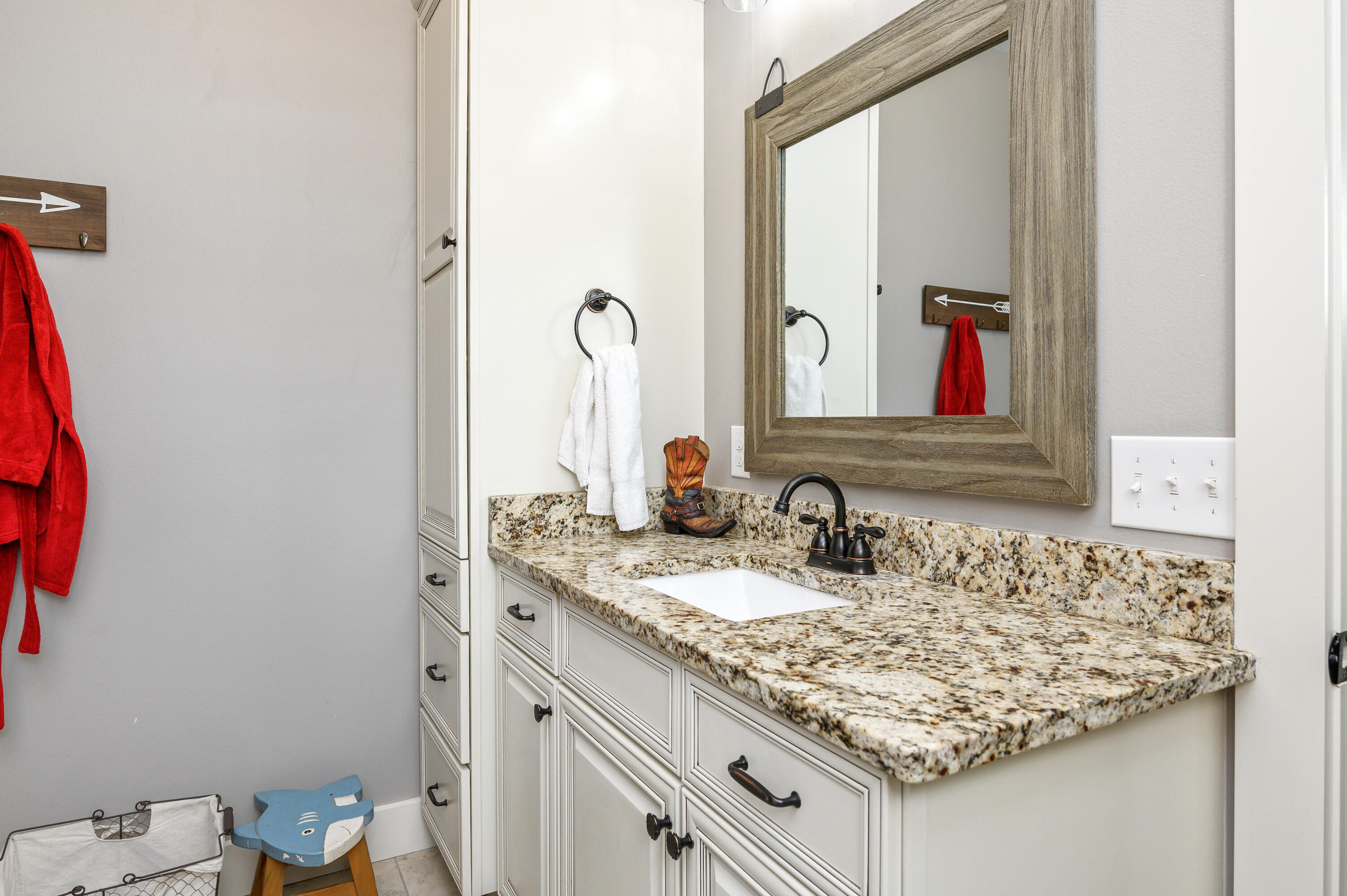 6053 Dairy Road Baker, FL 32531 - Photo 36 of 55 a bathroom with a granite countertop sink and a mirror