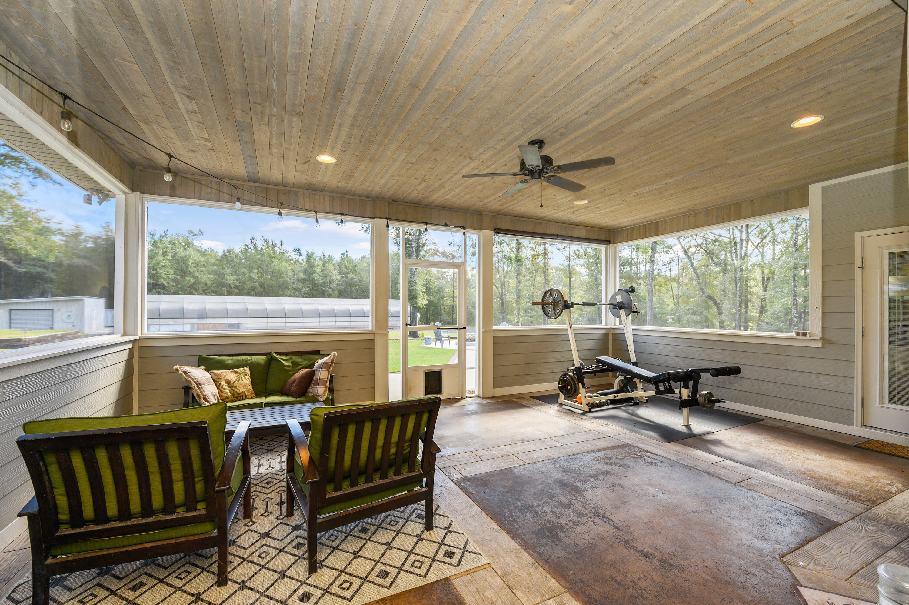 6053 Dairy Road Baker, FL 32531 - Photo 39 of 55 a living room with furniture and a large window
