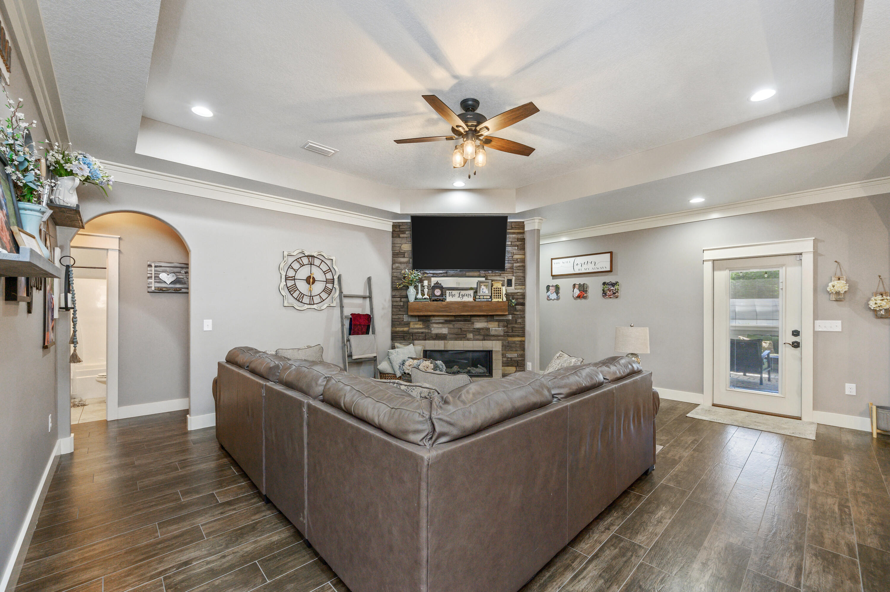 6053 Dairy Road Baker, FL 32531 - Photo 10 of 55 a living room with stainless steel appliances kitchen island granite countertop furniture and a fireplace