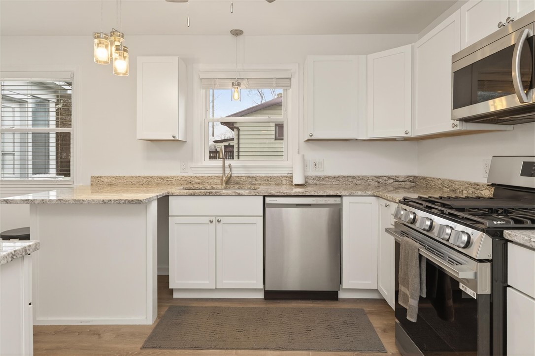 667 Hard Road Webster, NY 14580 - Photo 14 of 45 Granite counter tops with SS appliances.