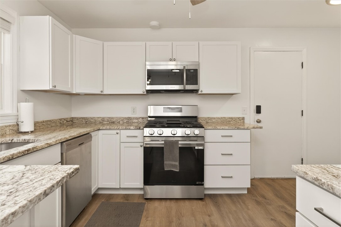 667 Hard Road Webster, NY 14580 - Photo 17 of 45 Gas range is not connected or plugged in yet.