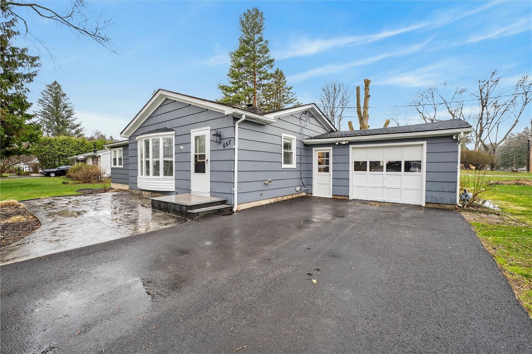 667 Hard Road Webster, NY 14580 - Photo 2 of 45 New driveway and front concrete patio.