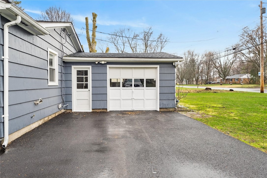 667 Hard Road Webster, NY 14580 - Photo 4 of 45 Single door garage actually can fit two cars insid