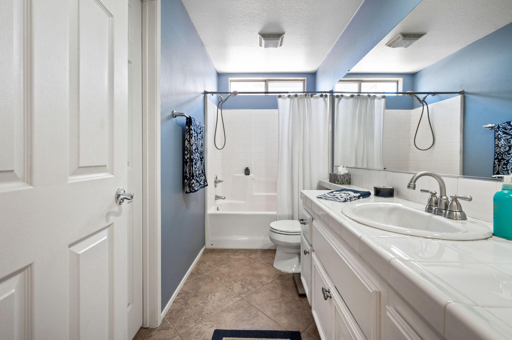 83414 Greenbrier Drive Indio, CA 92203 - Photo 23 of 43 a bathroom with a sink a toilet and shower